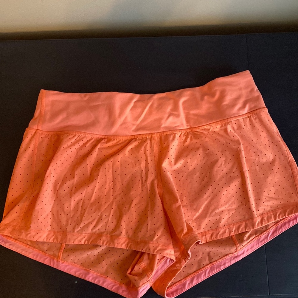 Lululemon Athletica orange shorts size 8